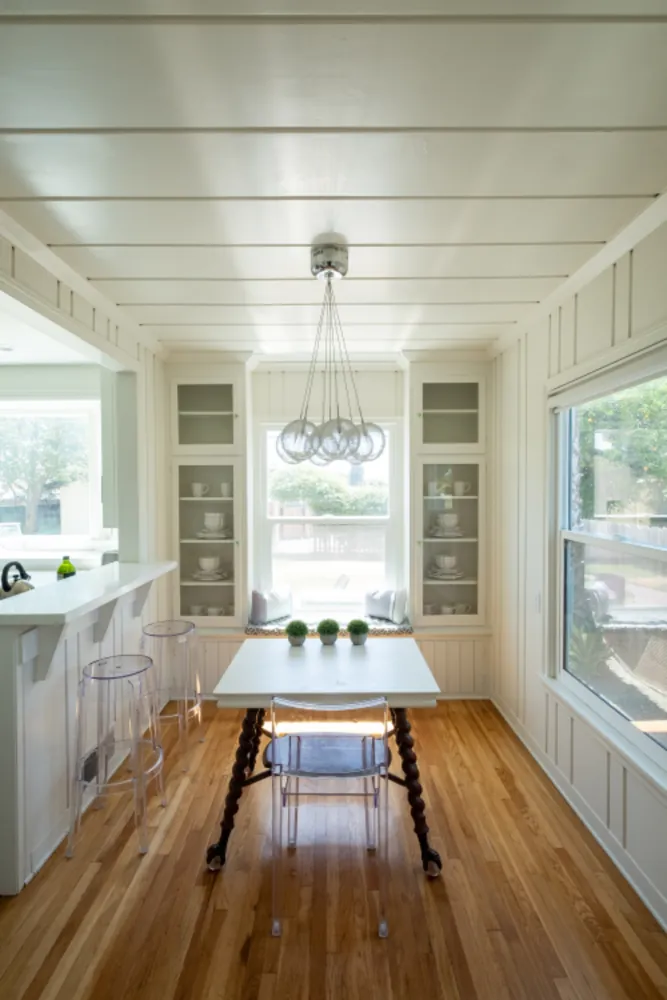 Dining nook with warm hardwood flooring